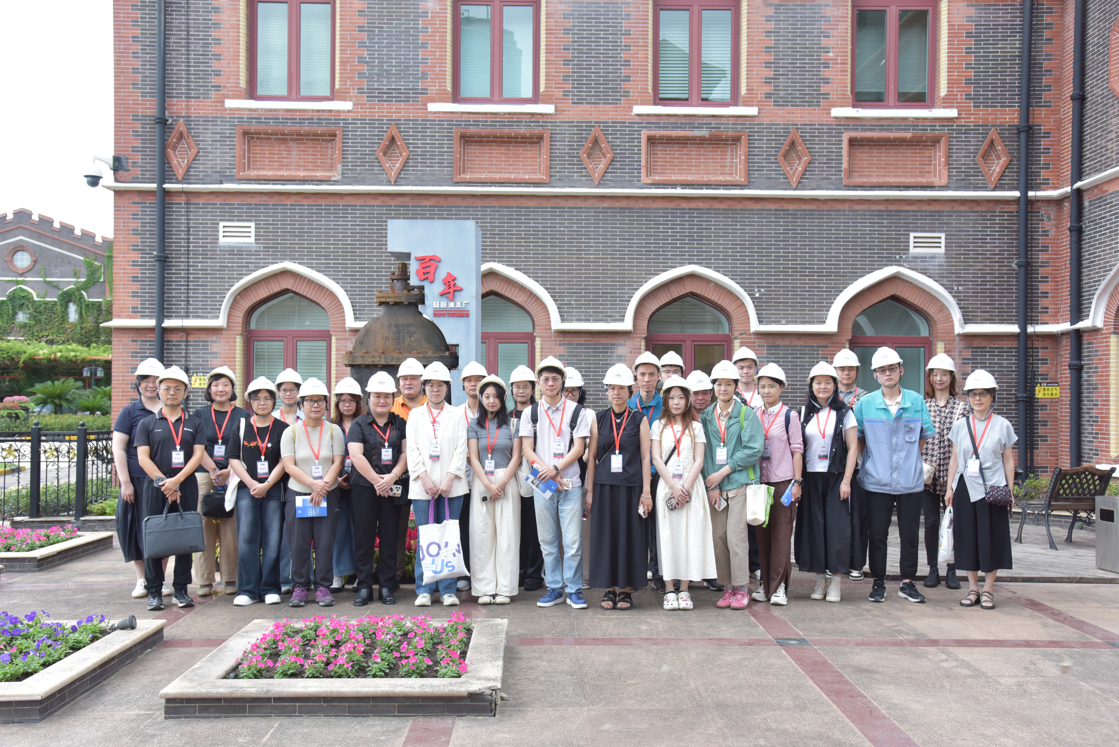 上午水廠合影57505c0102acb51033c86c3a849b2a26.jpg